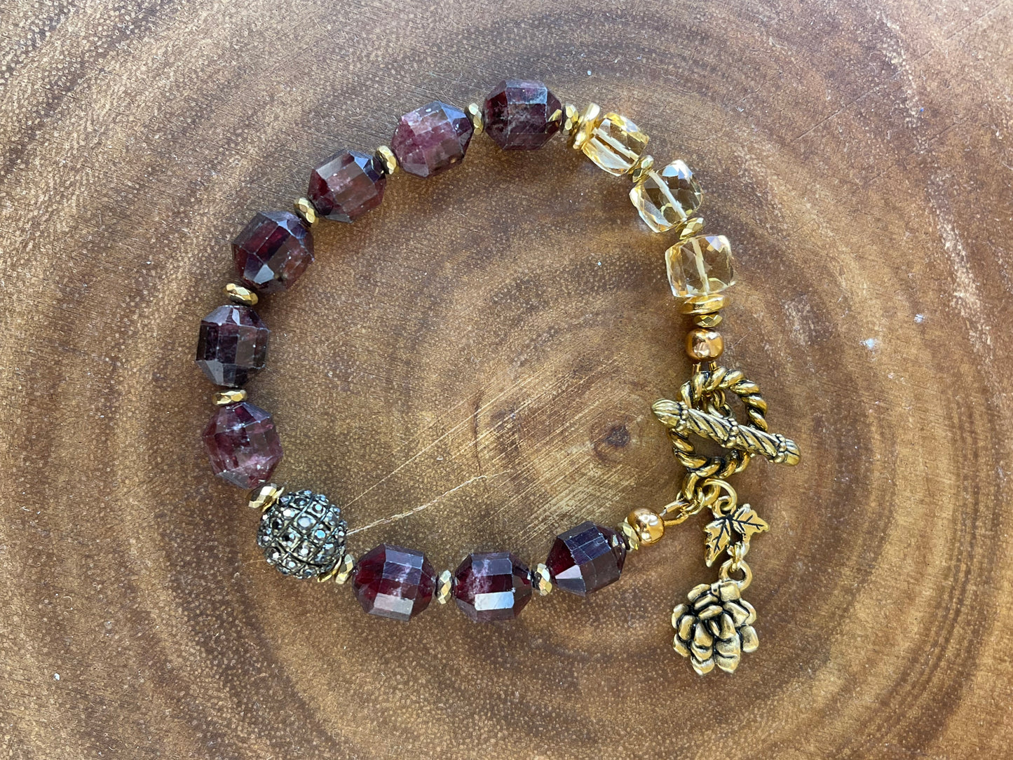 Garnet beaded bracelet with floral and leaf accents