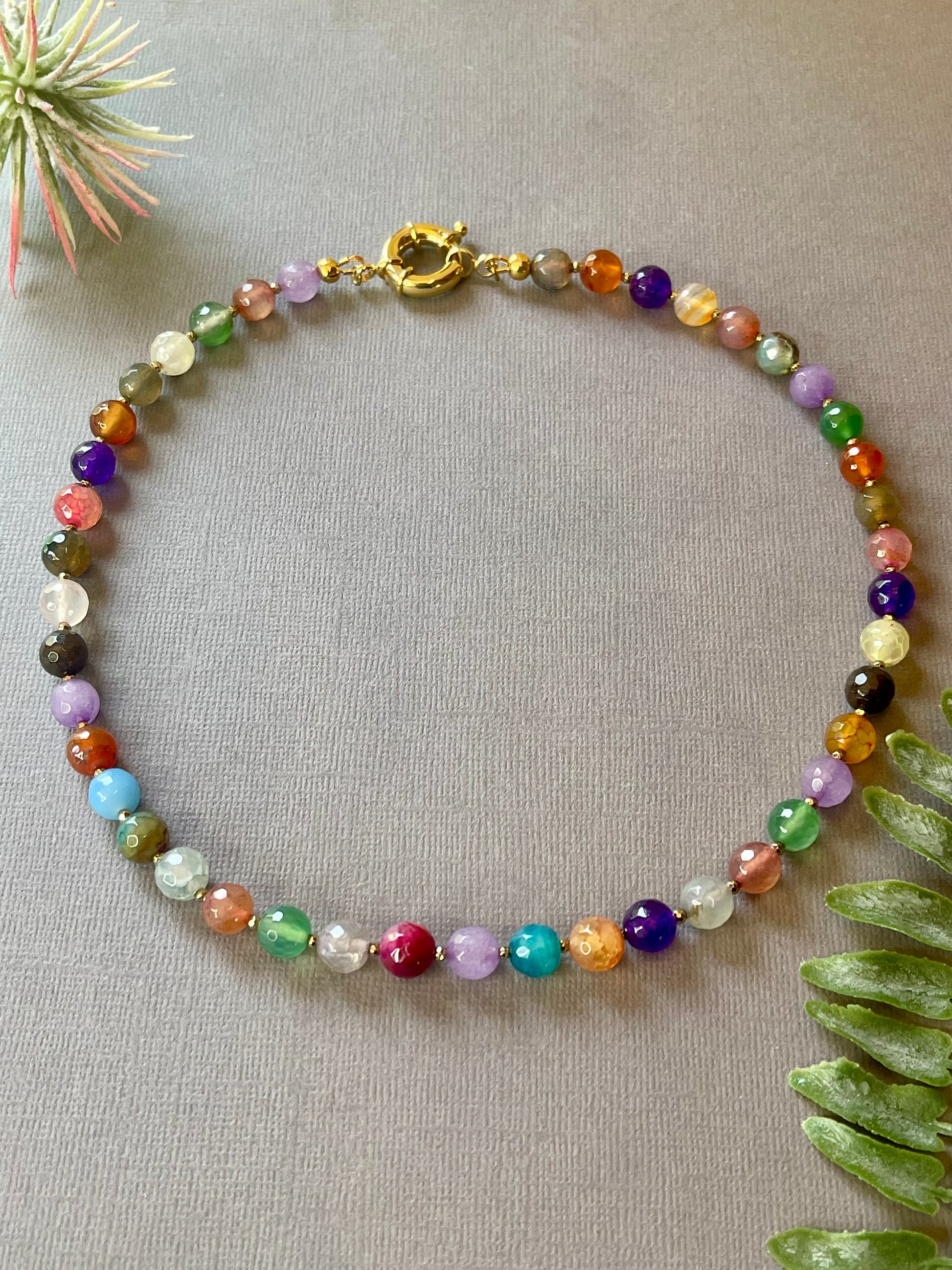 Handmade colorful gemstone necklace
Natural Gemstone Necklace with gold accents
Colorful everyday gemstone necklace
Layering gemstone necklace for women