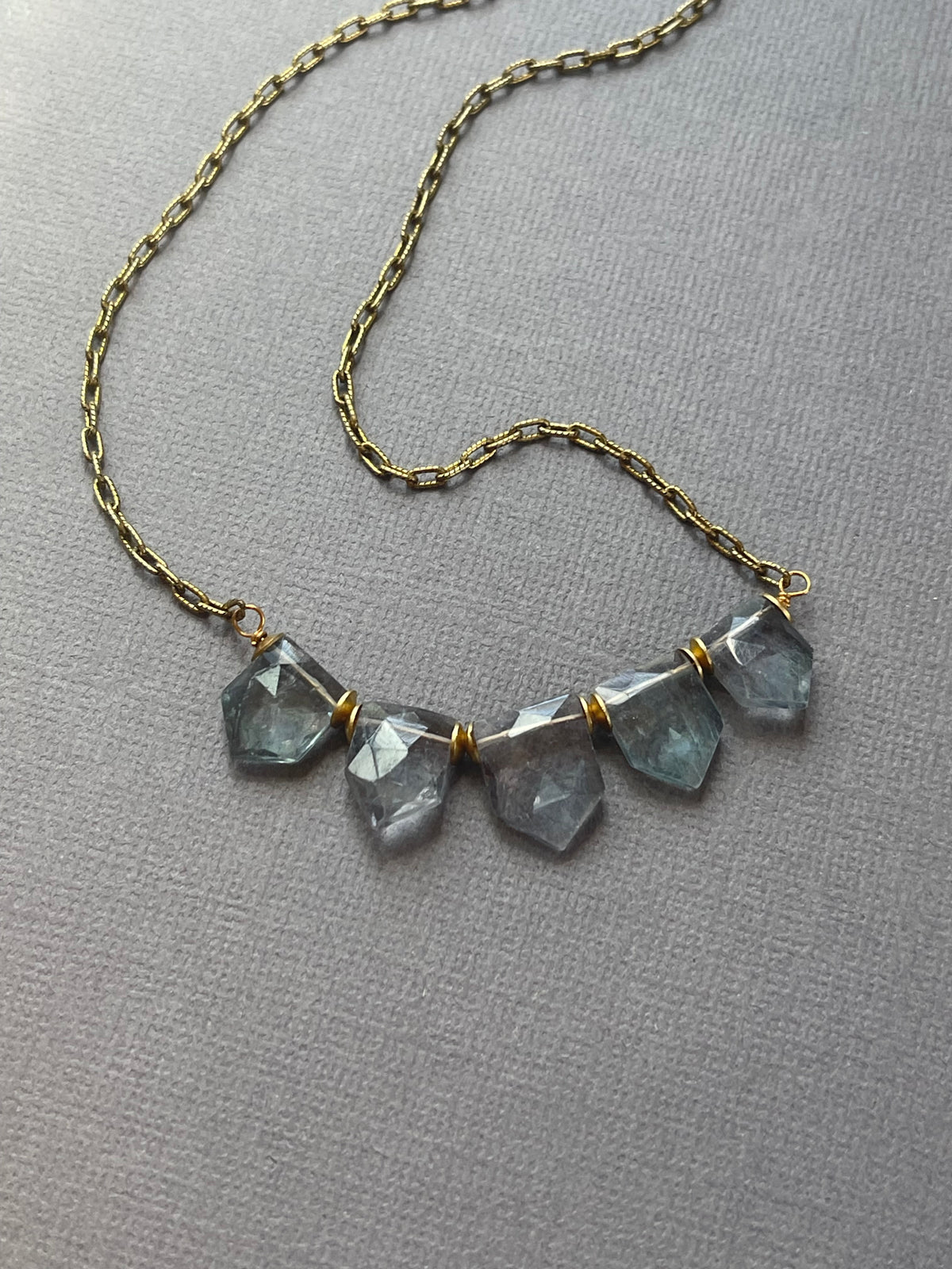 Close up of fluorite gemstone necklace