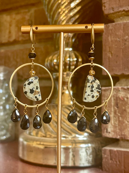Black onyx and Dalmatian jasper earrings with brass half-moon hoop style