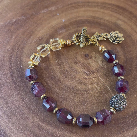 handmade garnet gemstone bracelet wih floral details