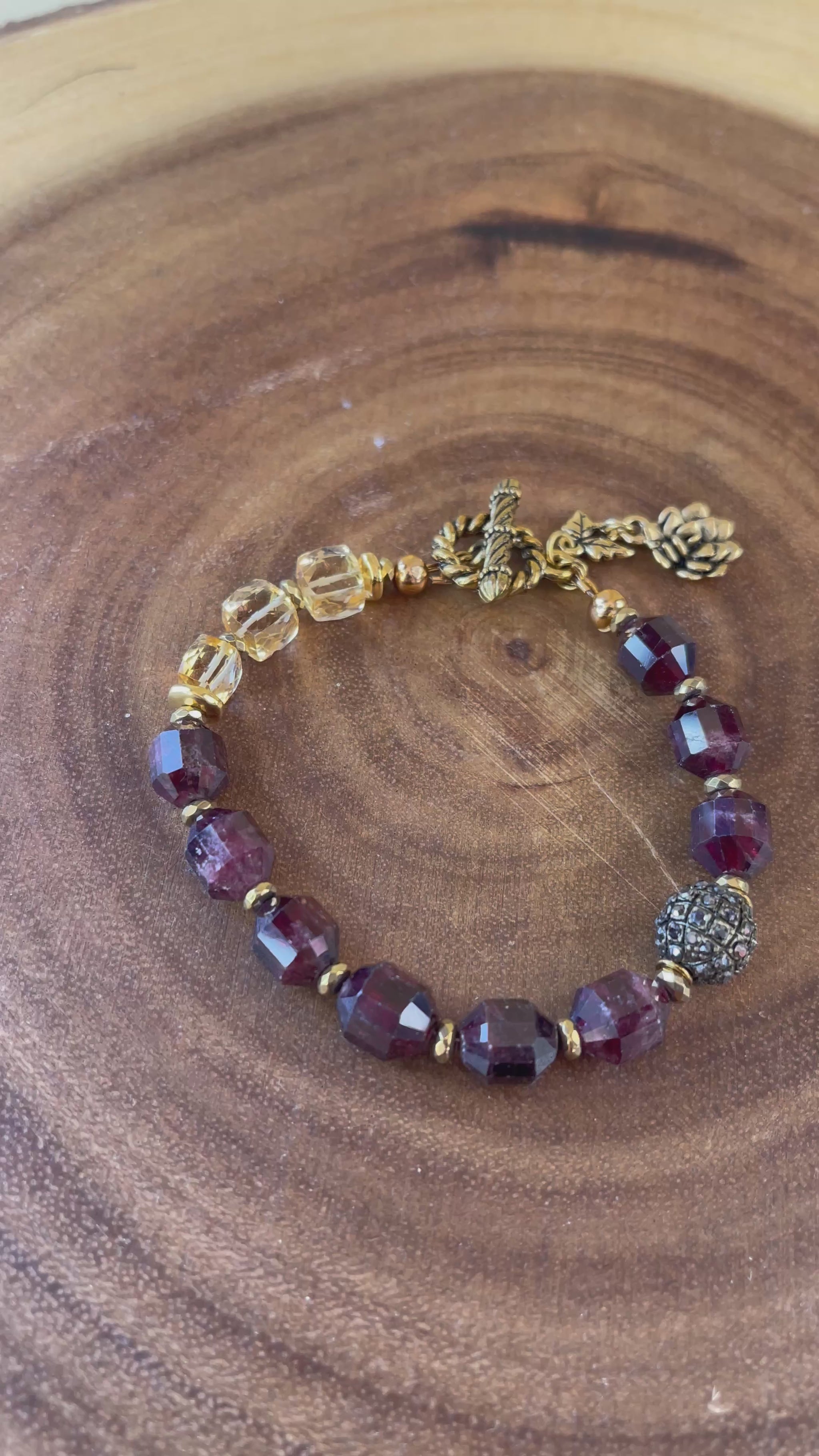 handmade garnet gemstone bracelet wih floral details